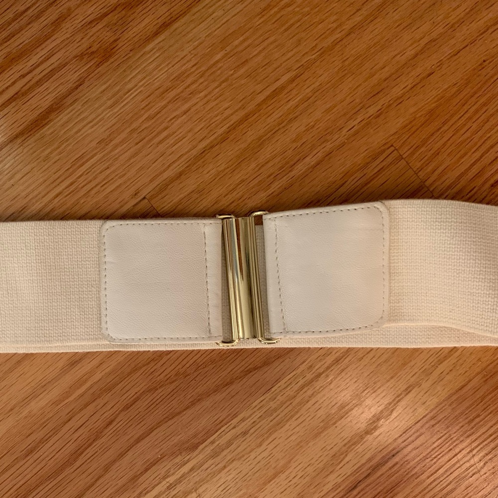 cream elastic belt with gold buckle